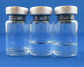Three see-through vials that contains a clear liquid.